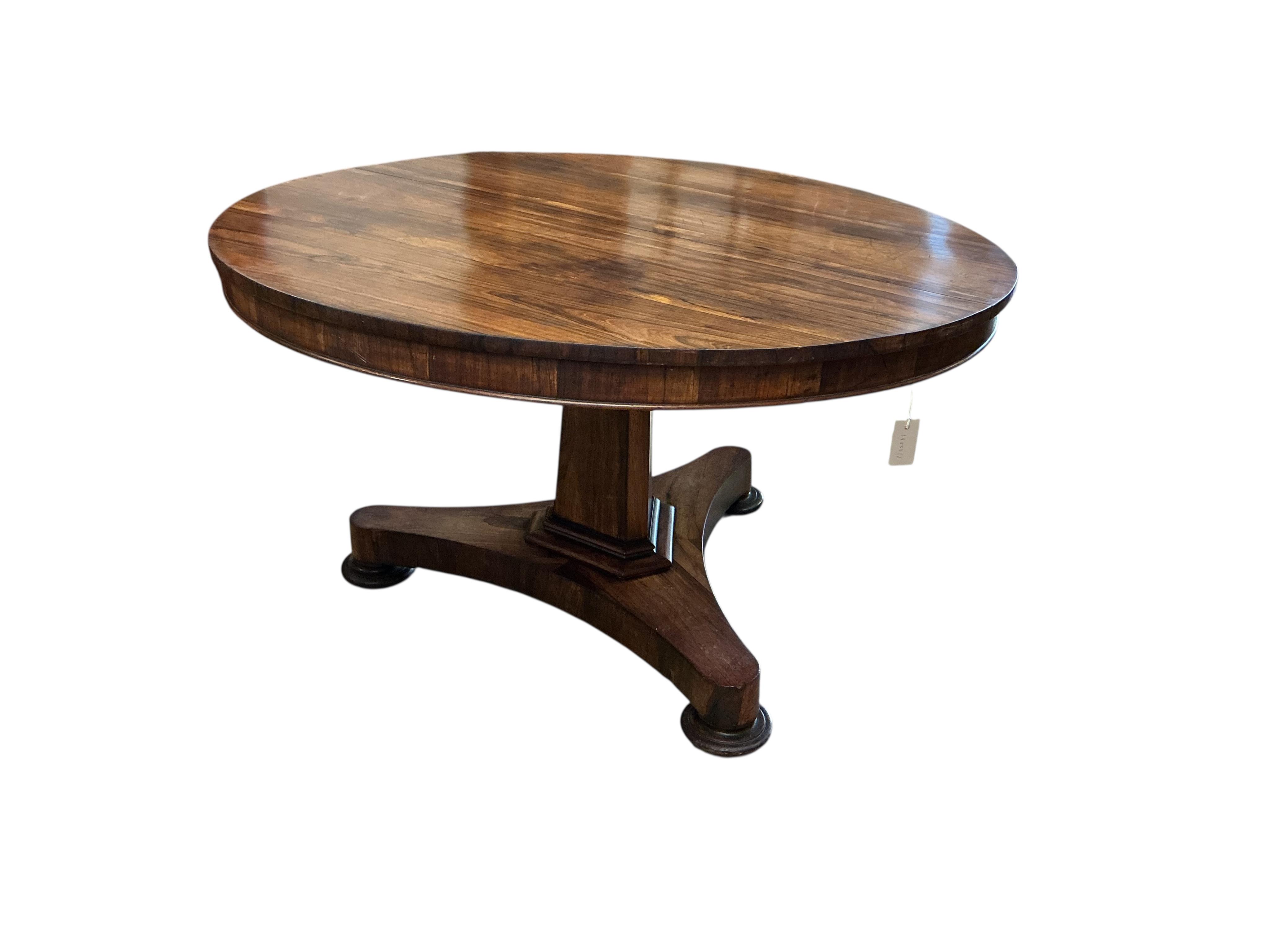 An early Victorian circular rosewood tilt top breakfast table, diameter 130cm, height 74cm